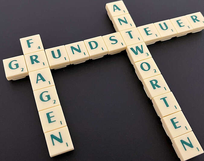 Scrabble-Text Grundsteuer Fragen Antworten